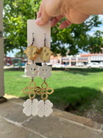 Lasercut Acrylic Earrings made by Johnny Postoak Jr.