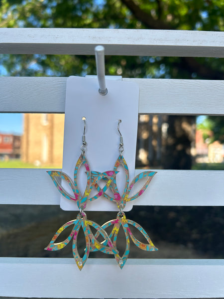 Acrylic Lasercut Earrings made by Johnny Postoak Jr.