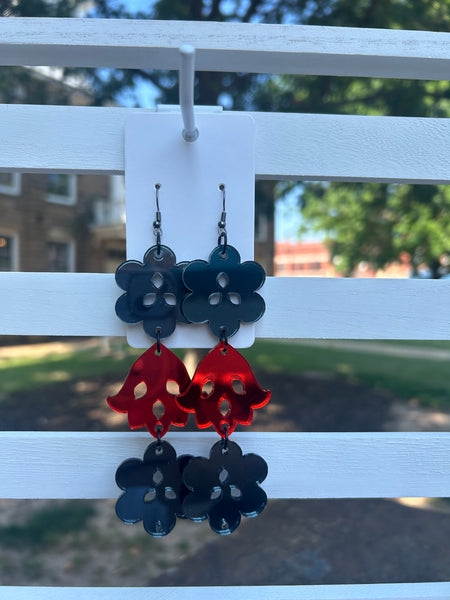 Lasercut Acrylic Earrings made by Johnny Postoak Jr.